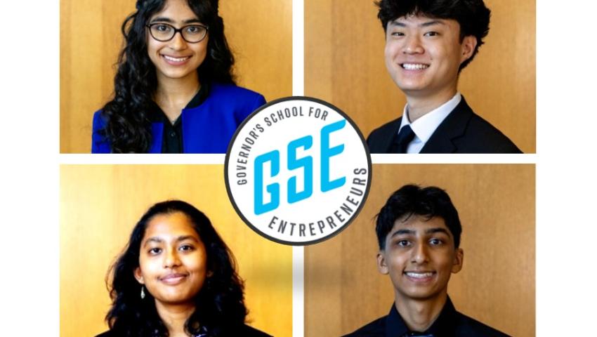 four students around the GSE logo